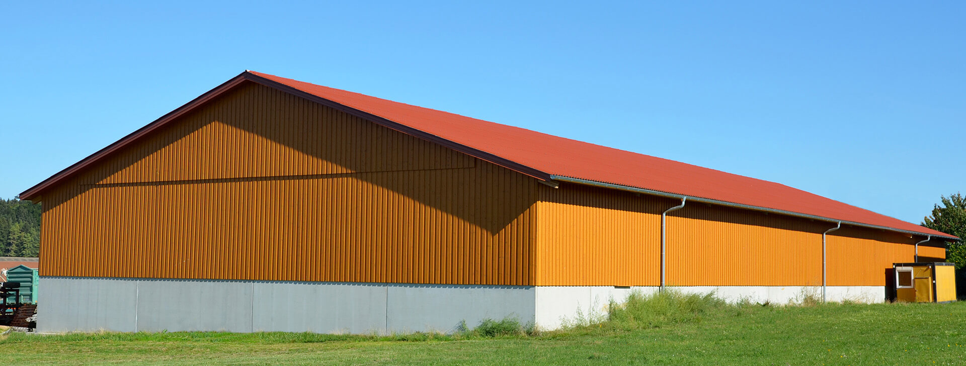 Haly pro zemědělskou techniku  - Haly a skladovací prostory - WOLF System